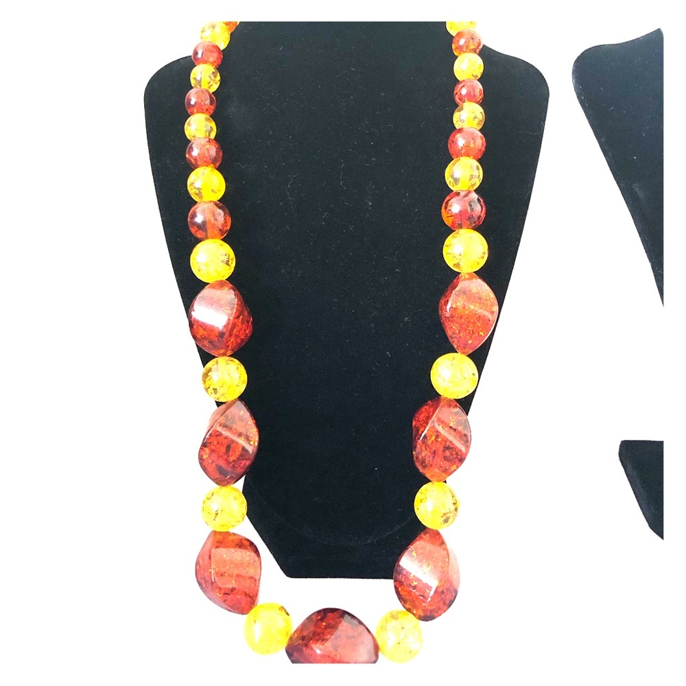 NEW set of artificial amber necklace and bracelet.